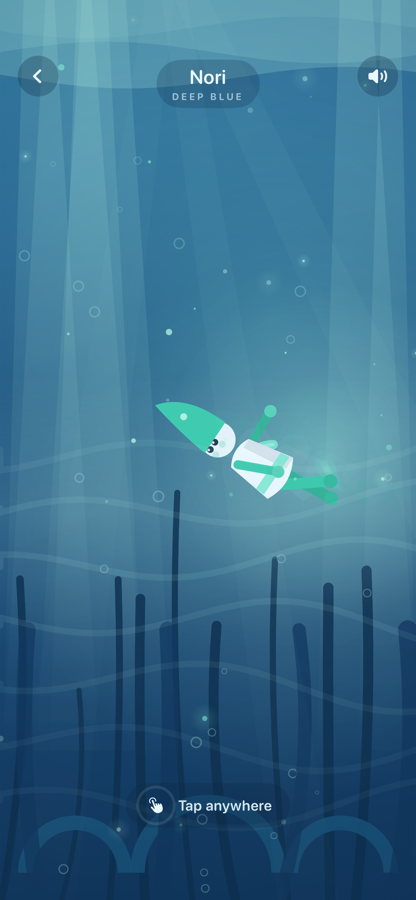 Nori swimming through shafts of light in deep blue water